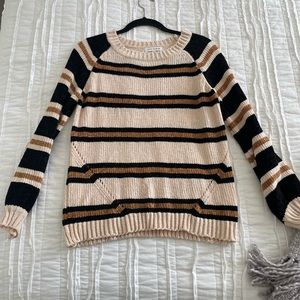 Cream, black & white knit sweater. Very soft material.
